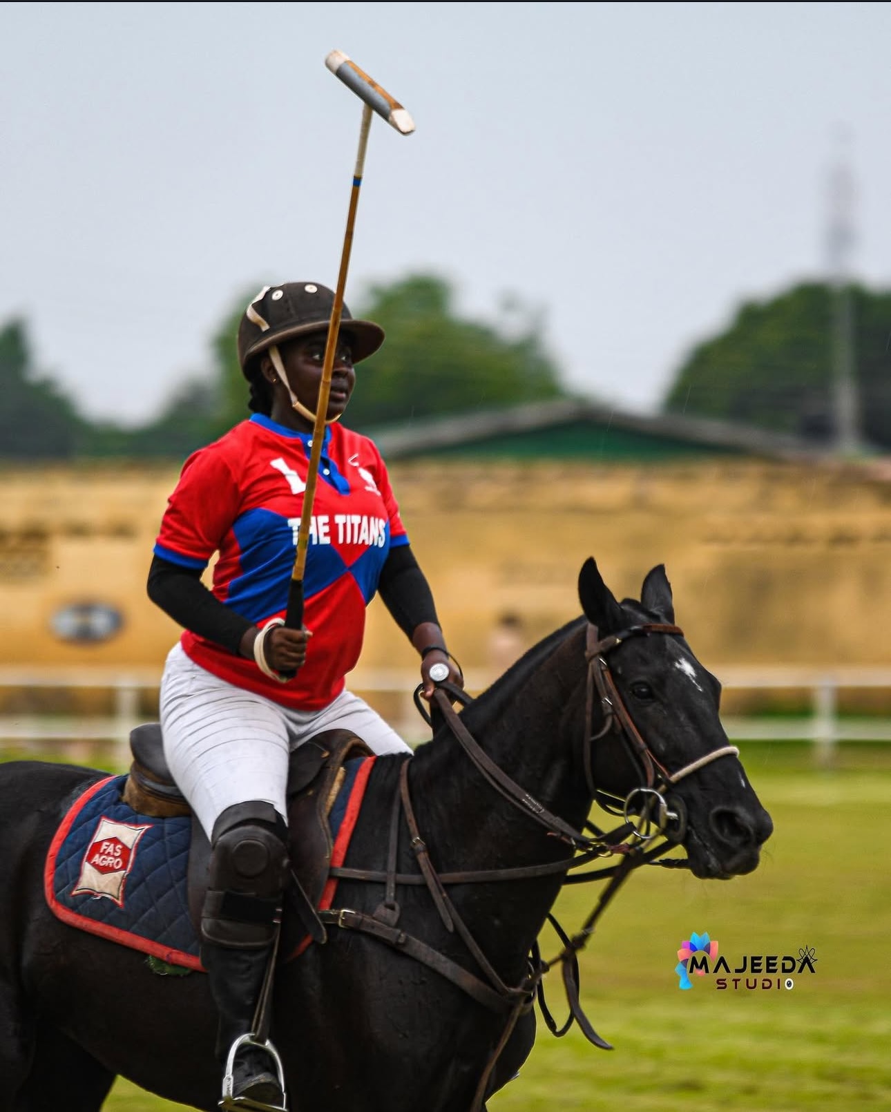 Aisha Ahmad Suleiman competing on horseback in a tournament
